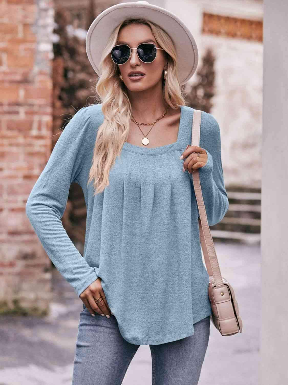 Double Take Pleated Detail Curved Hem Long Sleeve Top Pastel Blue Blouses - Tophatter Daily Deals