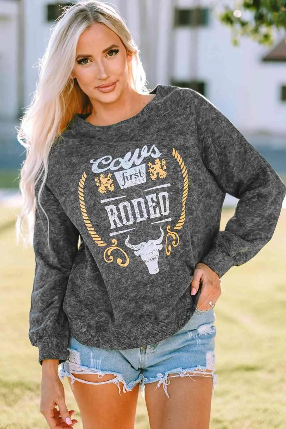 Mineral Washed COW'S FIRST RODEO Round Neck Raglan Sleeve Sweatshirt Graphic Sweatshirt - Tophatter Daily Deals