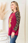 Heimish Full Size Animal Print Reindeer Top Women's T-Shirts - Tophatter Daily Deals